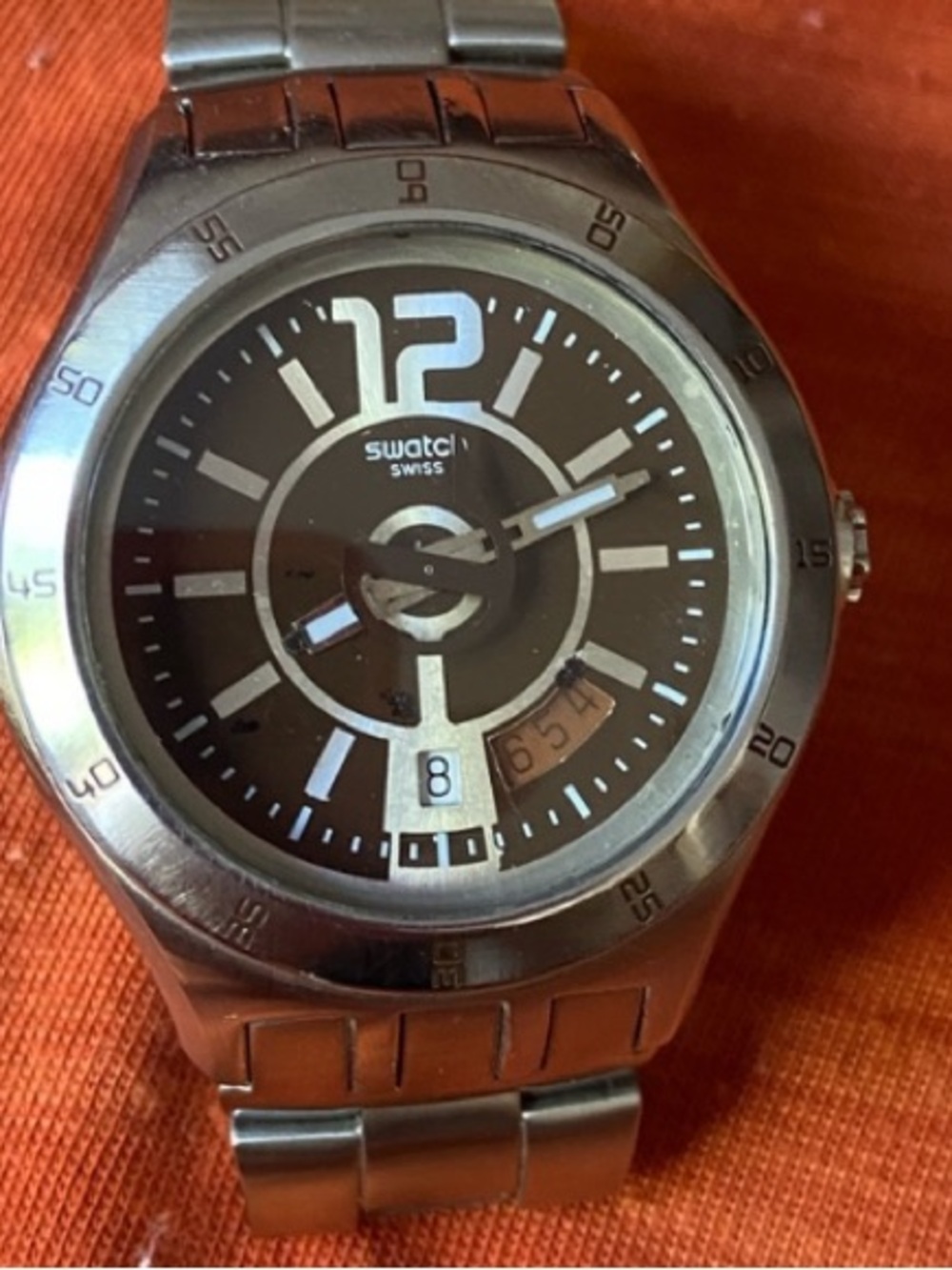 Swatch Silver Stainless Steel Watch with Brown Dial and White Accents